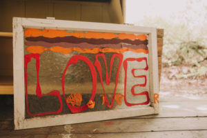 garden shed, sign / old window with the inscription 'Love' garden shed, sign / old window with the inscription 'Love'